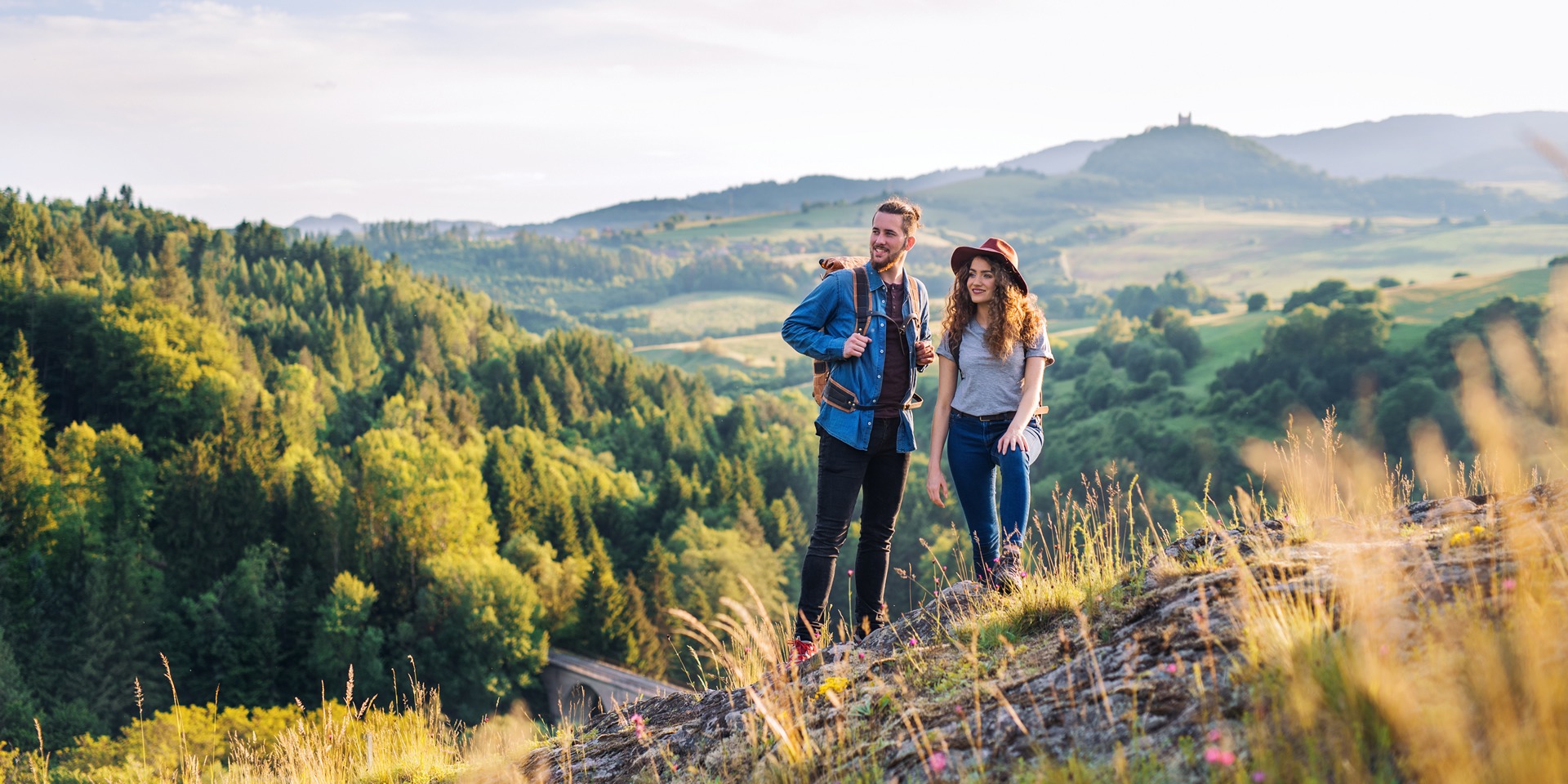 young-tourist-couple-travellers-with-backpacks-hik-2024-10-22-07-14-26-utc-2